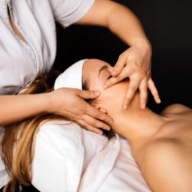 beautiful-woman-enjoying-massage-TTEGVPX